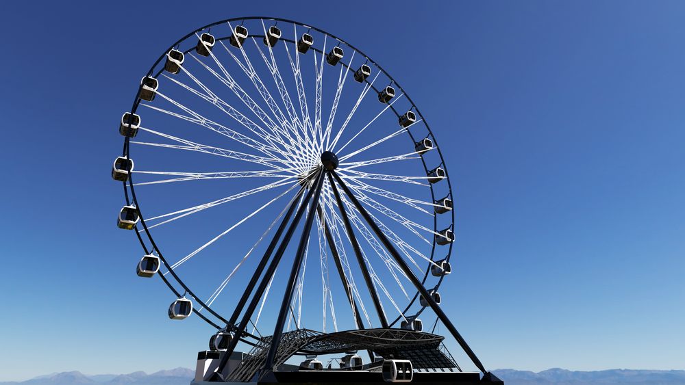 Het witte reuzenrad tegen een strakblauwe lucht